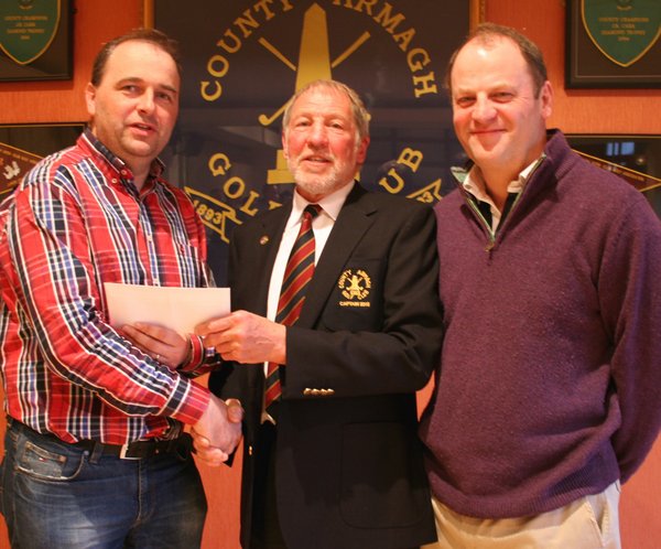 County Armagh Golf Club Captain John Flack presents Jim McCreesh with his prize after winning the Easter Stableford competition. Included is Ian Millar, category runner-up County Armagh Golf Club Captain John Flack presents Jim McCreesh with his prize after winning the Easter Stableford competition. Included is Ian Millar, category runner-up