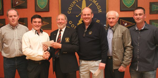 County Armagh Golf Club Captain is pictured with winners of the Waltz Classic. The winning team included Nathan Grimley (second from left), Ian O’Hea (second from right), Barry Scully (not pictured) and Conlon Rice (not pictured). Paul Corvan (left) captained the second placed team of Declan Lenagh, Kieran Mullan ad Derek McKeever. Thomas Murry (right) and Leo McCann (left) represent the third place team which included Seamus McCann and Brian McCormick County Armagh Golf Club Captain is pictured with winners of the Waltz Classic. The winning team included Nathan Grimley (second from left), Ian O’Hea (second from right), Barry Scully (not pictured) and Conlon Rice (not pictured). Paul Corvan (left) captained the second placed team of Declan Lenagh, Kieran Mullan ad Derek McKeever. Thomas Murry (right) and Leo McCann (left) represent the third place team which included Seamus McCann and Brian McCormick